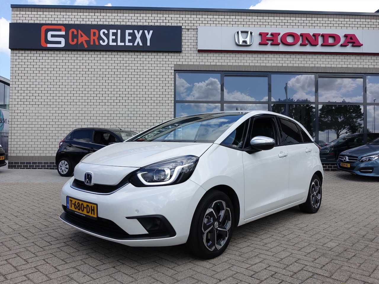 Honda Jazz - 1.5 i-MMD 109pk Hybrid CVT Executive Trekhaak - AutoWereld.nl