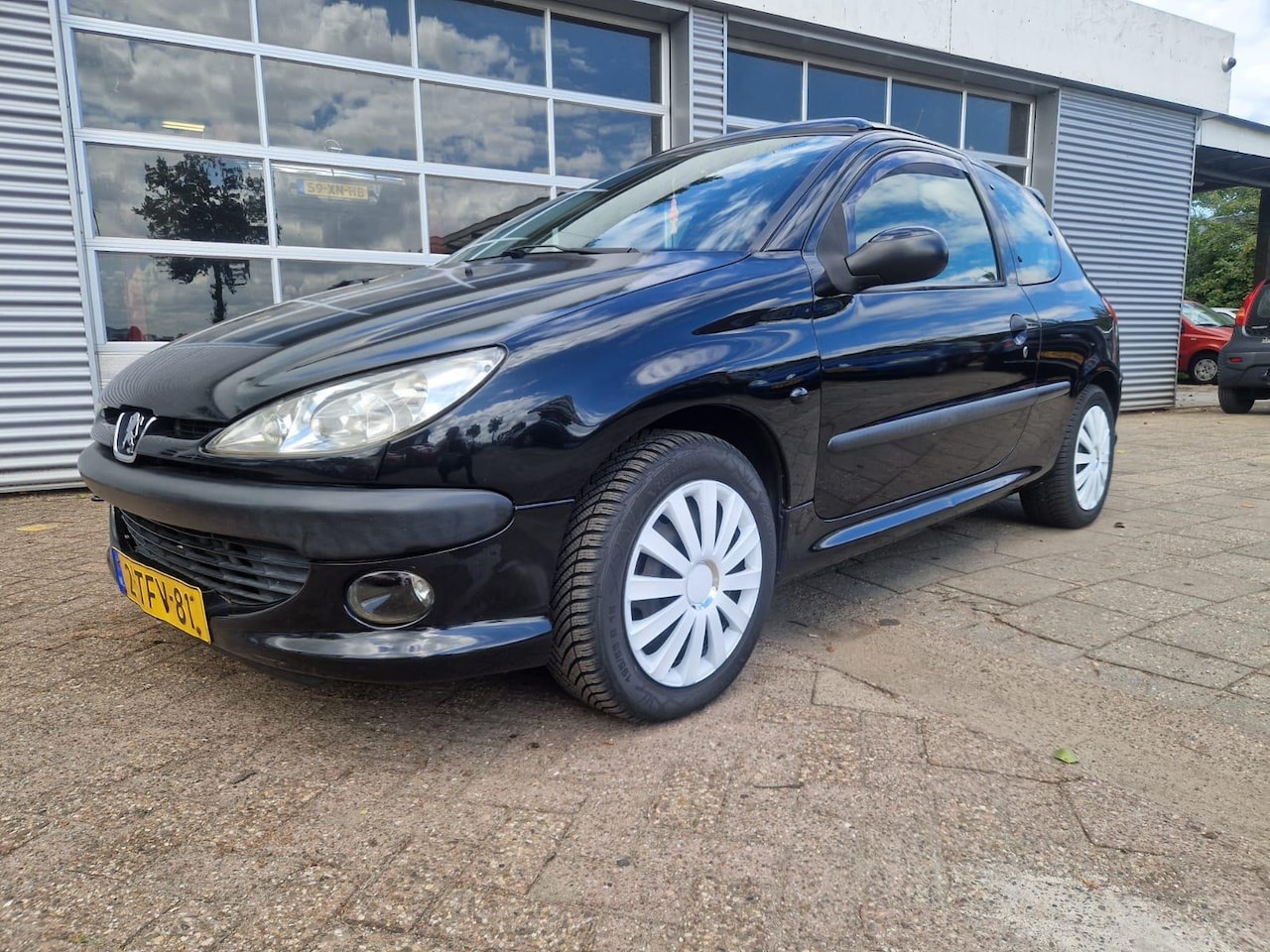Peugeot 206 - 1.6-16V XS Premium 1.6-16V XS Premium - AutoWereld.nl