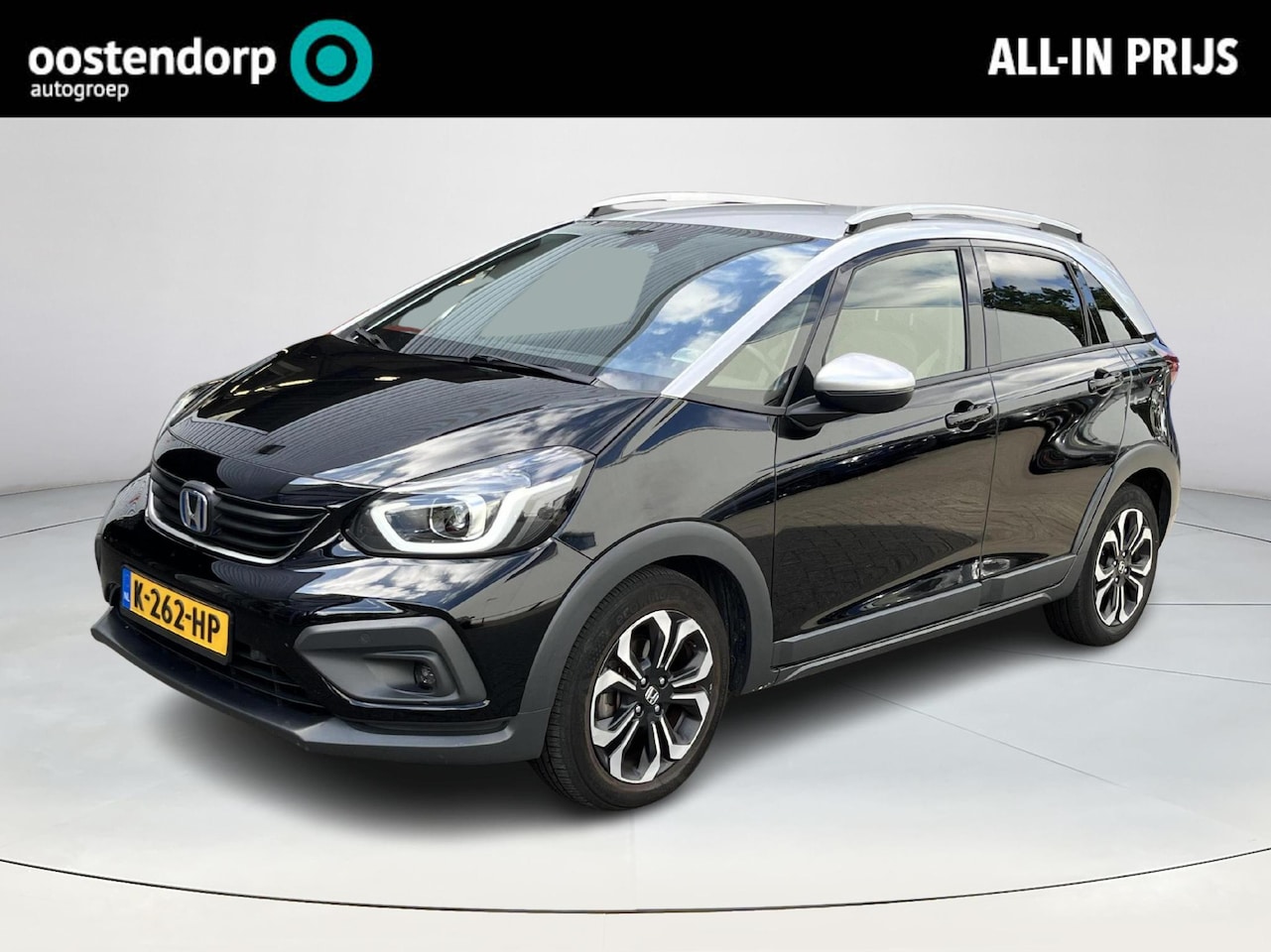 Honda Jazz - 1.5 e:HEV Crosstar zwart met zilver dak - AutoWereld.nl