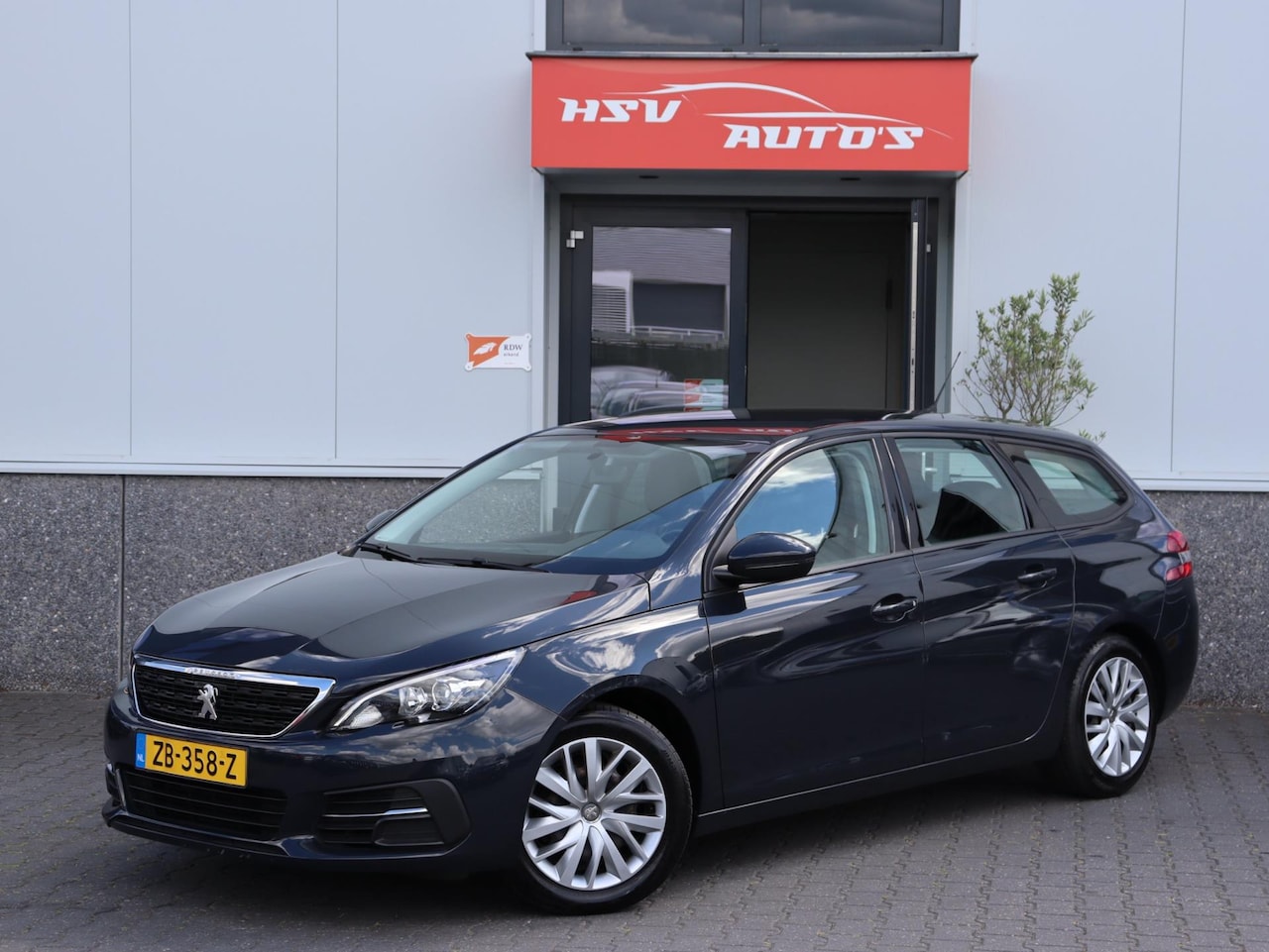 Peugeot 308 SW - 1.2 PureTech Blue Lease navi LEER org NL - AutoWereld.nl