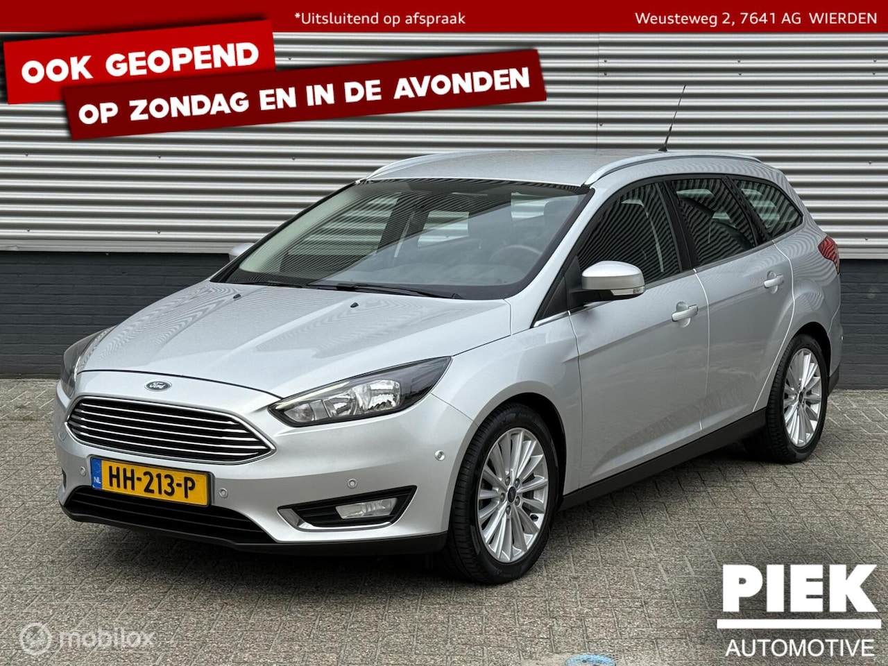 Ford Focus Wagon - 1.0 Titanium Edition NAVIGATIE, TREKHAAK - AutoWereld.nl