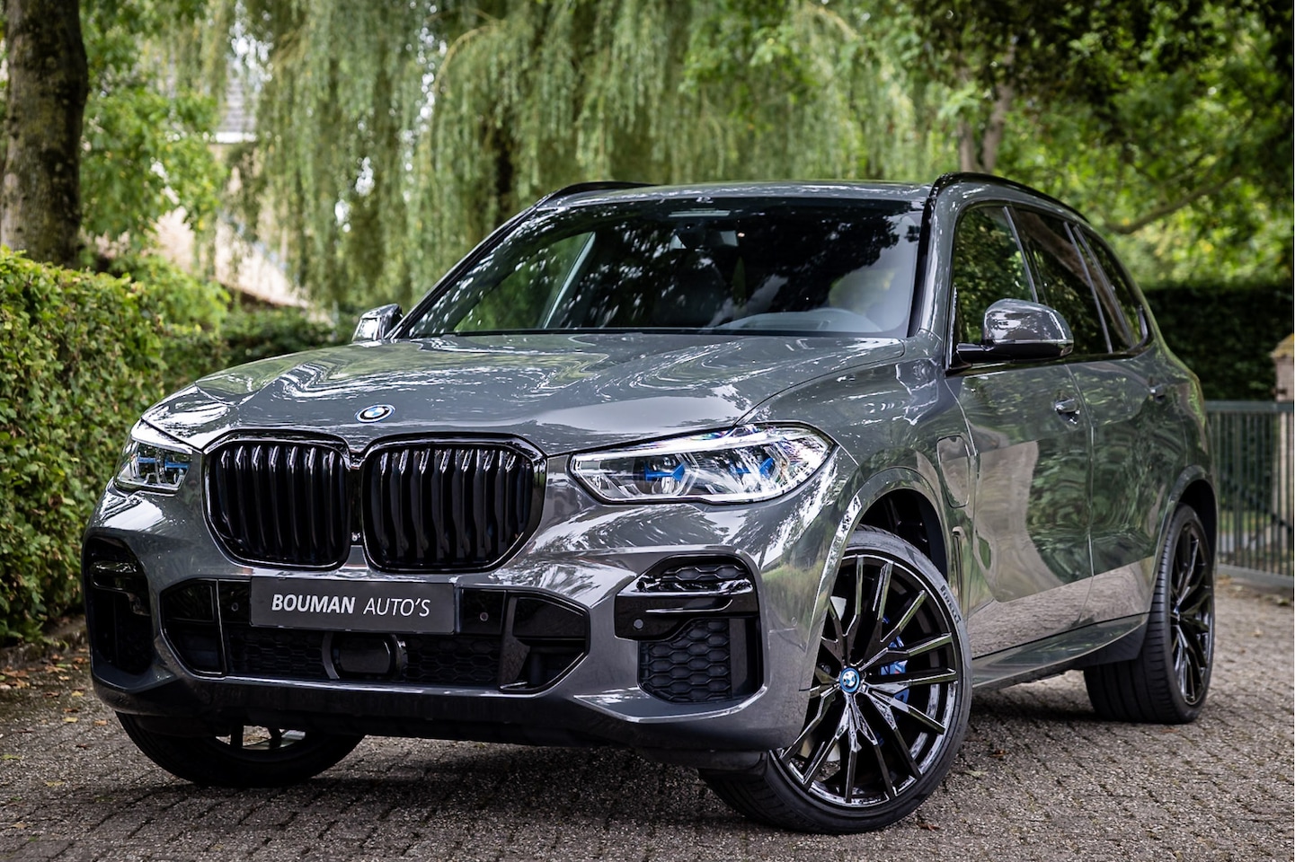 BMW X5 - xDrive45e M Sport Dravit Grau Sky Lounge Entertainment Carbon Laser - AutoWereld.nl