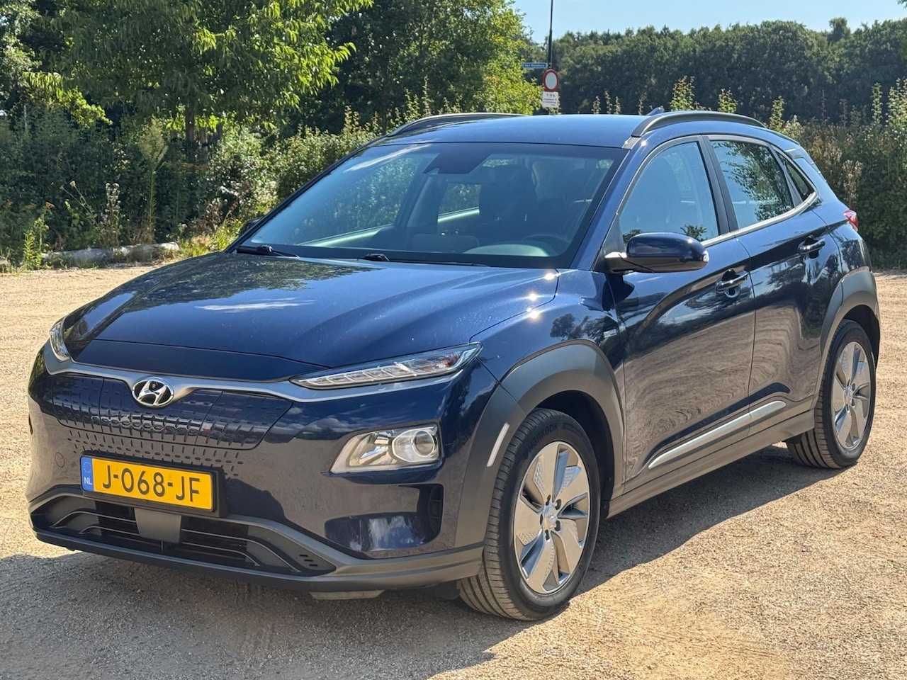 Hyundai Kona Electric - EV Comfort 64 kWh 3FASE SOH 100% *NAVI/CAMERA - AutoWereld.nl