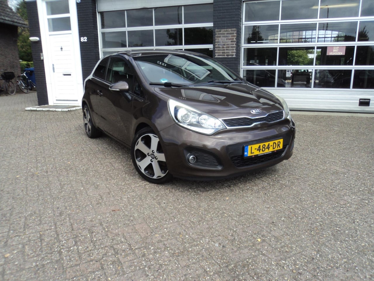 Kia Rio - 1.2 CVVT airco cruis stoelverwarming stuurverwaming - AutoWereld.nl