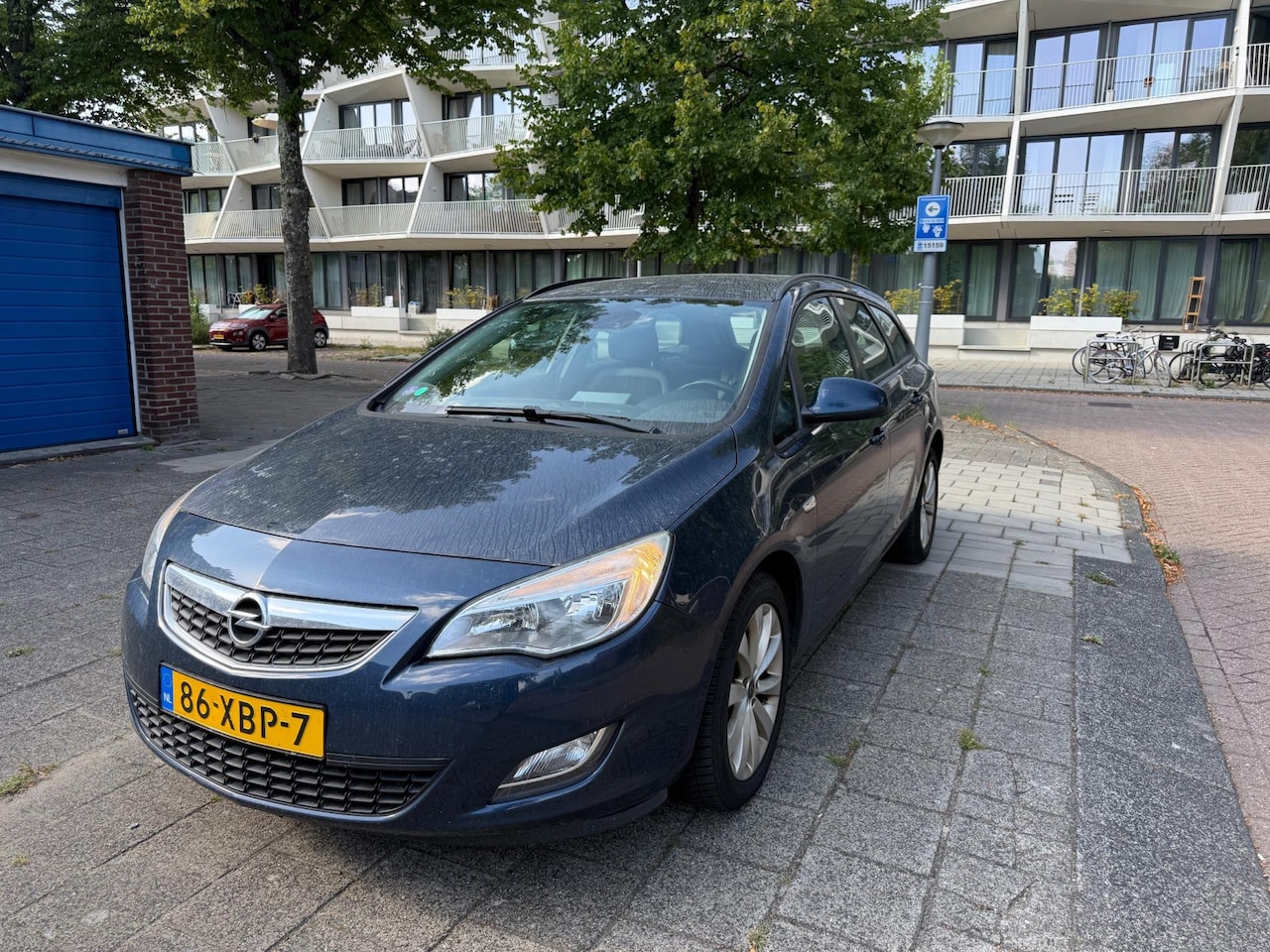 Opel Astra Sports Tourer - 1.4 Turbo Anniversary Edition 1.4 Turbo Anniversary Edition - AutoWereld.nl