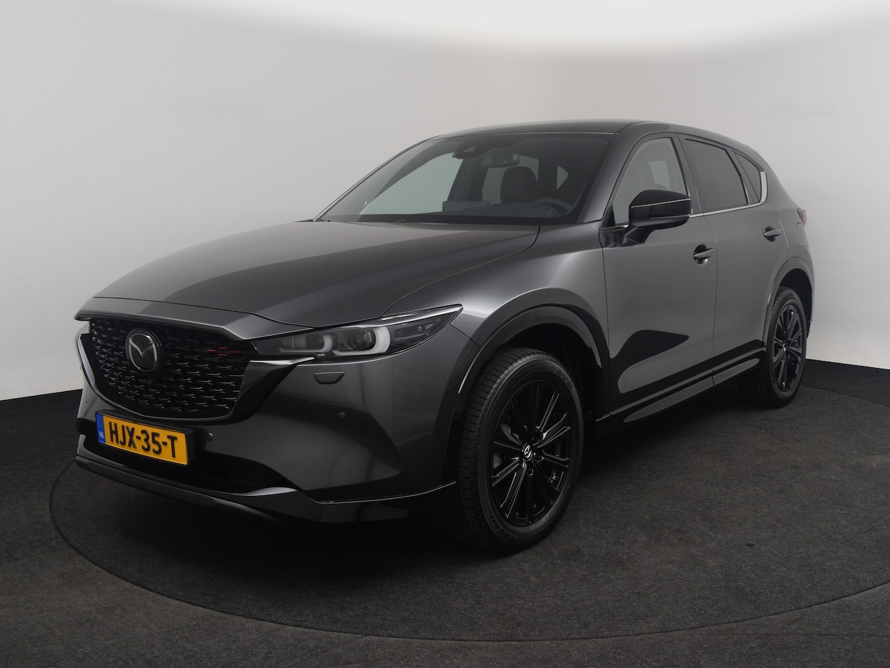 Mazda CX-5 - e-Skyactiv-G 165 Homura | 19-inch lichtmetalen velgen, Black Metallic | 360° View Monitor - AutoWereld.nl