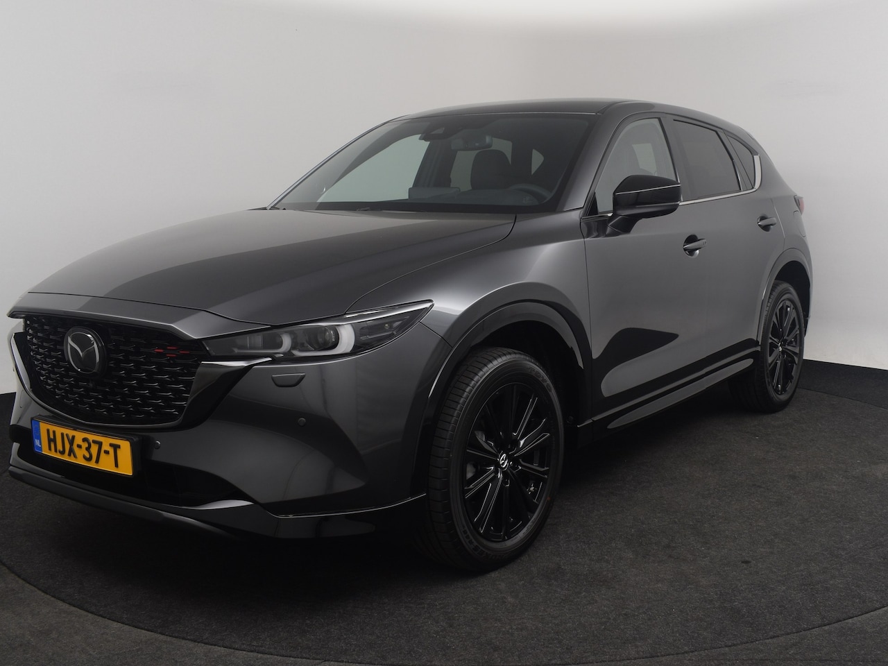 Mazda CX-5 - e-Skyactiv-G 165 Homura - Comfort Pack | 19-inch lichtmetalen velgen, Black Metallic | 360 - AutoWereld.nl