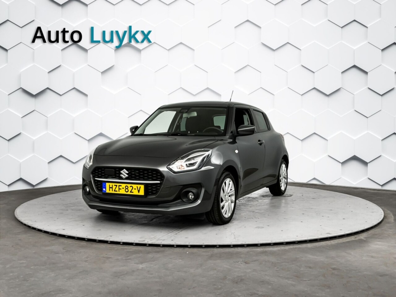 Suzuki Swift - 1.2 Select Smart Hybrid | Navigatie | Adaptieve Cruise Control | 16'' L.M. velgen - AutoWereld.nl