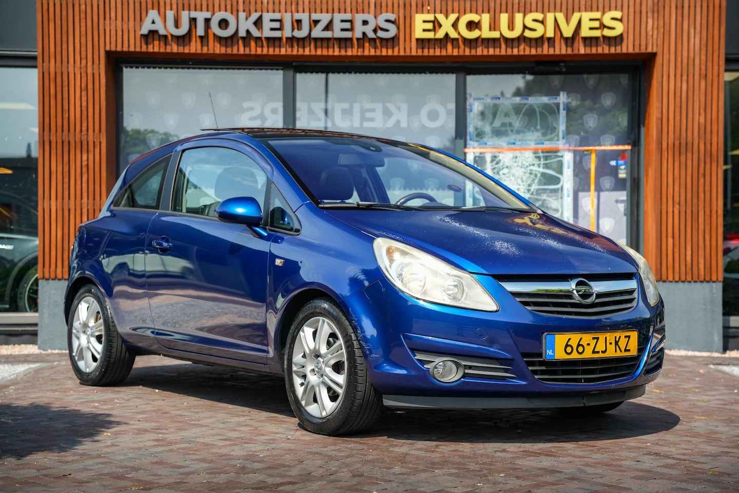 Opel Corsa - 1.4-16V Cosmo Panodak Cruise Airco Leer - AutoWereld.nl