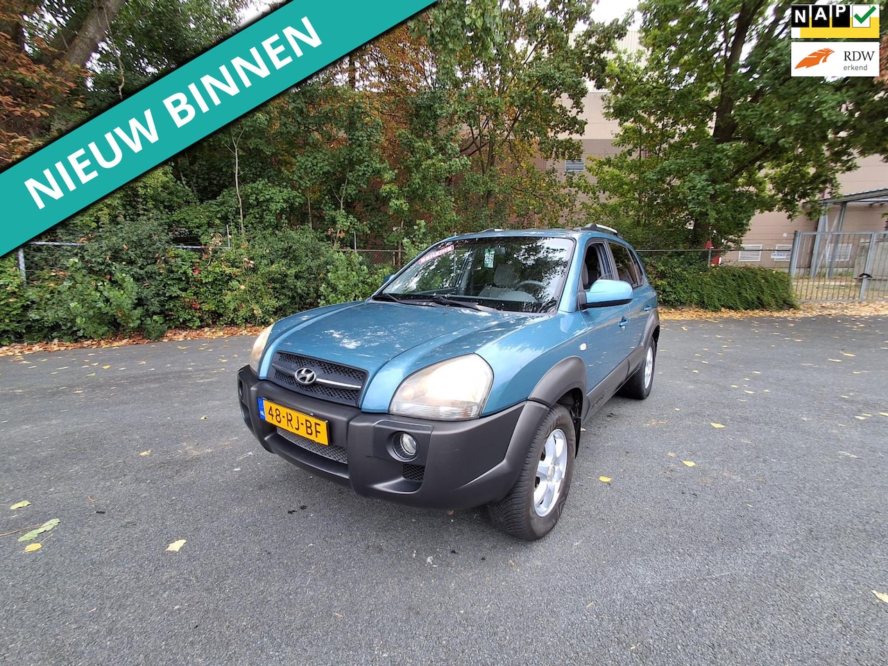 Hyundai Tucson - 2.0i Dynamic FIJNE HOGE INSTAP EN GOEDKOOP - AutoWereld.nl