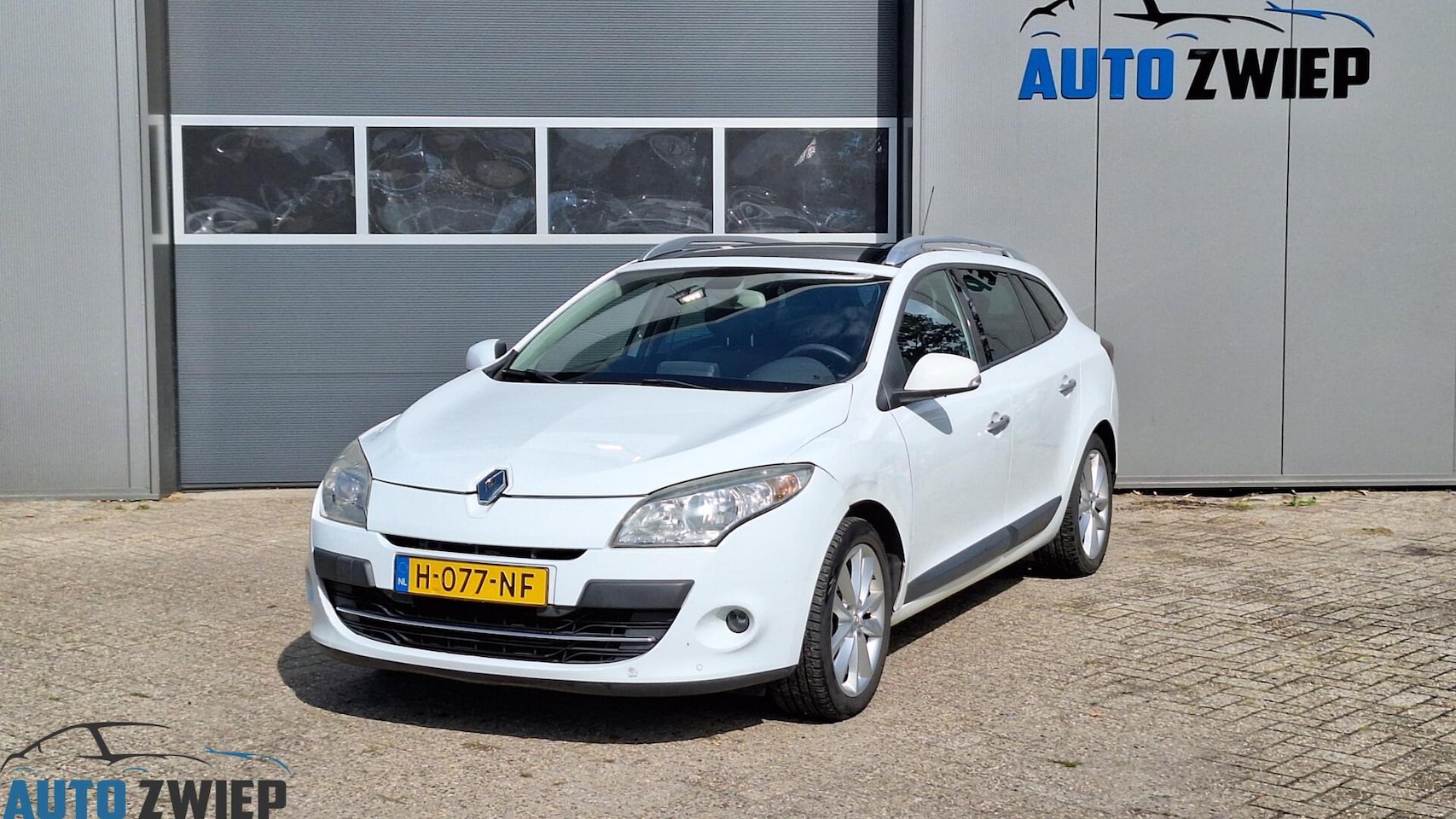 Renault Mégane Estate - 1.4 TCe Privilége trekhaak/leer/Navi - AutoWereld.nl