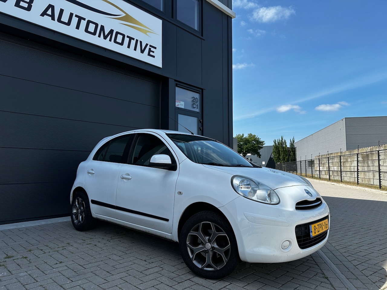 Nissan Micra - 1.2 Visia Pack | 5 DRS | Airco | Bluetooth | LM Velgen | Nieuwe APK - AutoWereld.nl