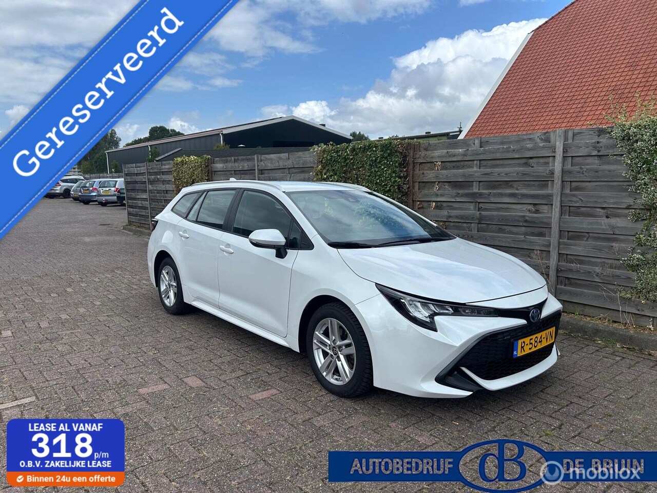 Toyota Corolla Touring Sports - 1.8 Hybrid Active Apple carplay - AutoWereld.nl
