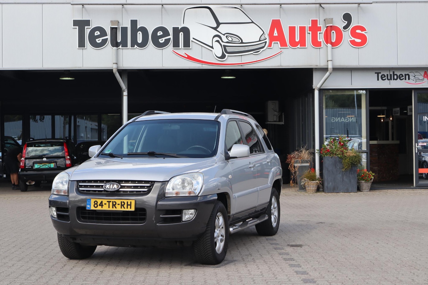 Kia Sportage - 2.0 CVVT Executive Cruise control, Climate control, Trekhaak - AutoWereld.nl