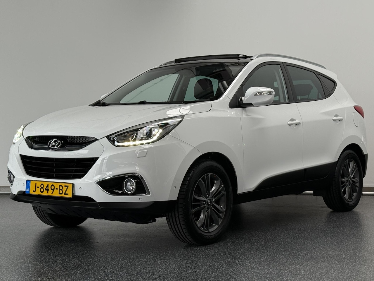 Hyundai ix35 - 1.6i GDI i-Catcher | Schuifdak | Leer | Camera | Navigatie - AutoWereld.nl