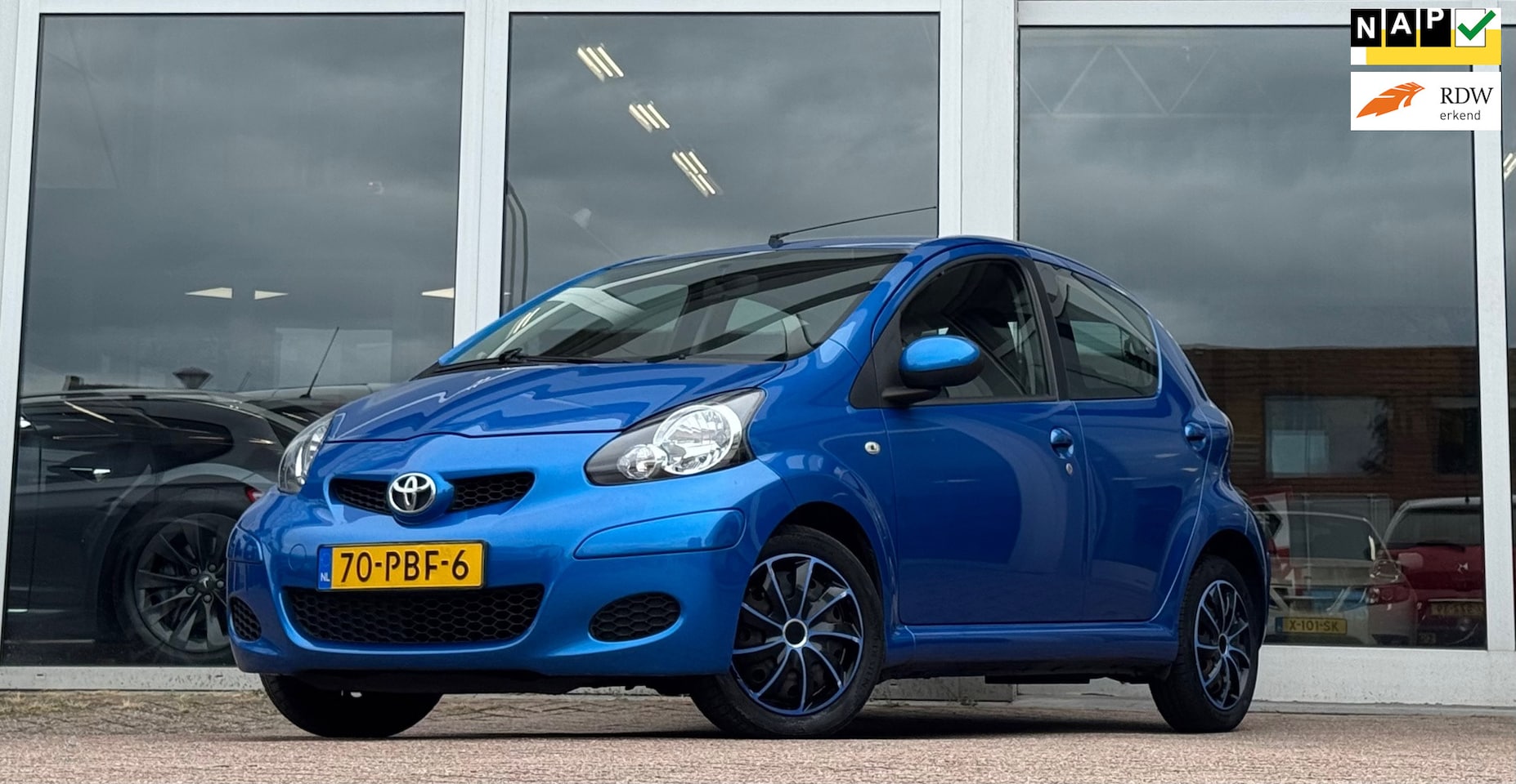 Toyota Aygo - 1.0i 12V Comfort Navigator 3e Eigenaar Allseason banden - AutoWereld.nl