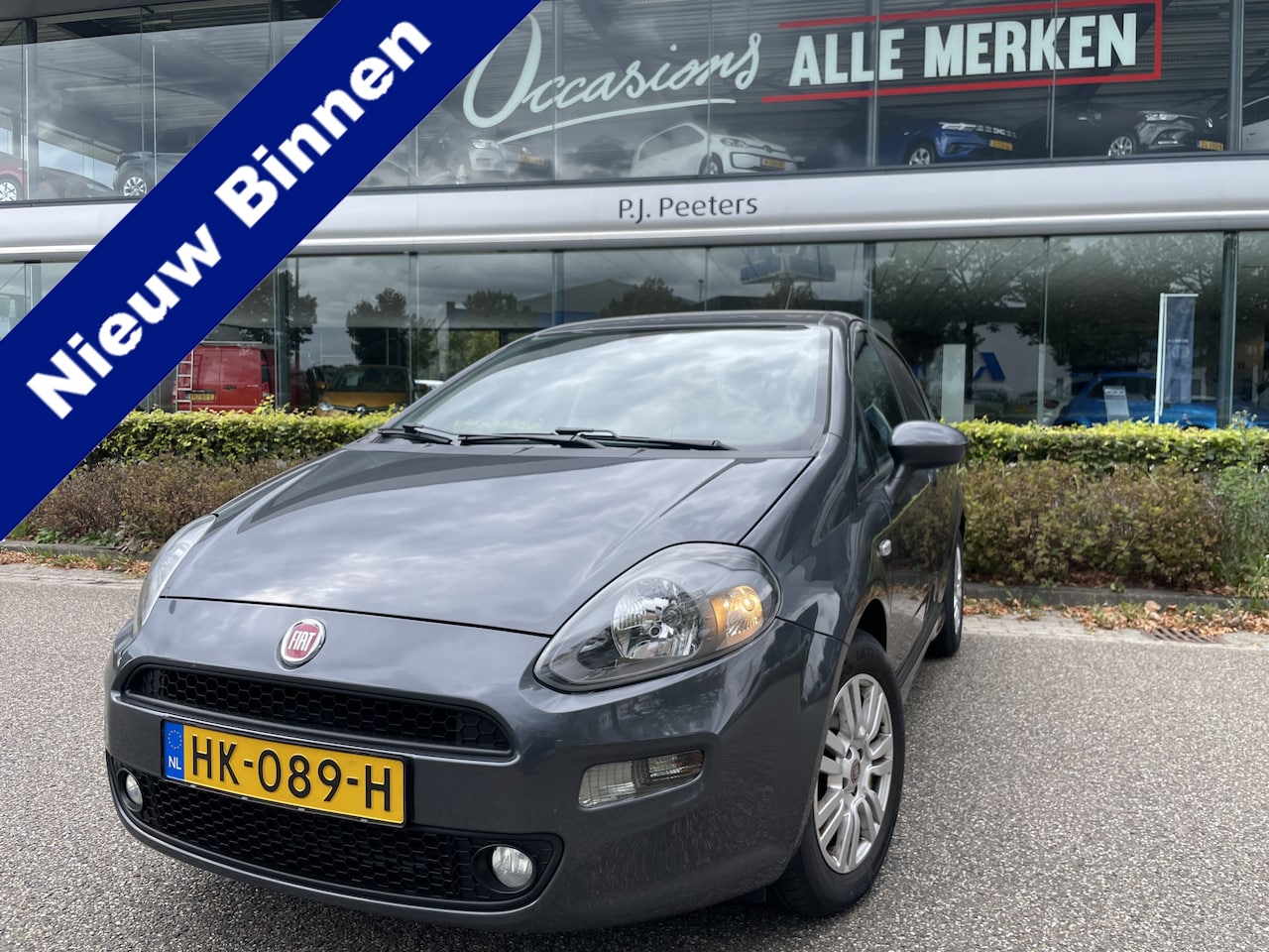 Fiat Punto Evo - 1.3 M-Jet Lounge Airco - Cruise control - Parkeersensoren achter - Stuur leder - AutoWereld.nl
