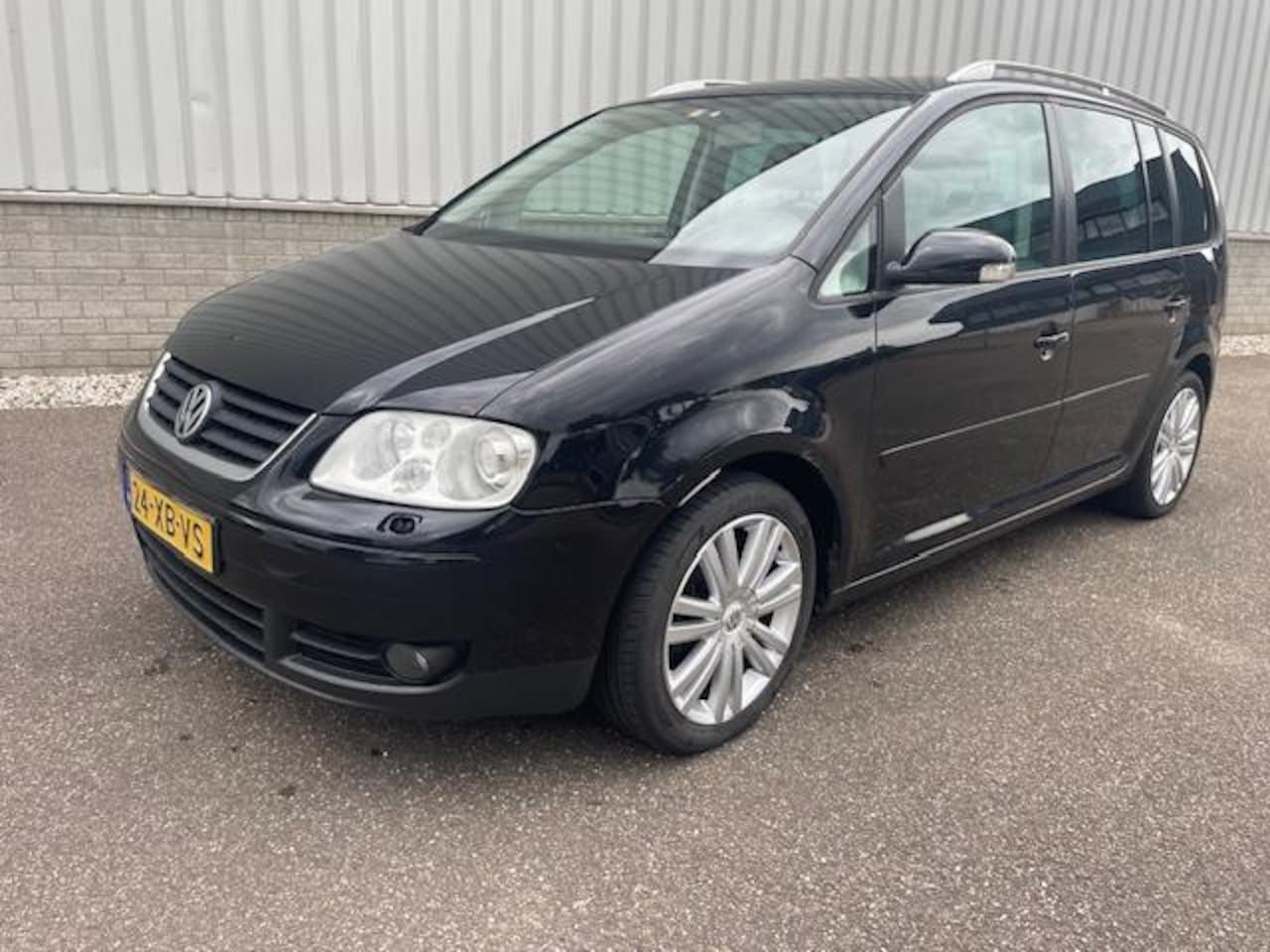Volkswagen Touran - 2.0 TDI Highline 7p. 2.0 TDI Highline 7 PERS - AutoWereld.nl