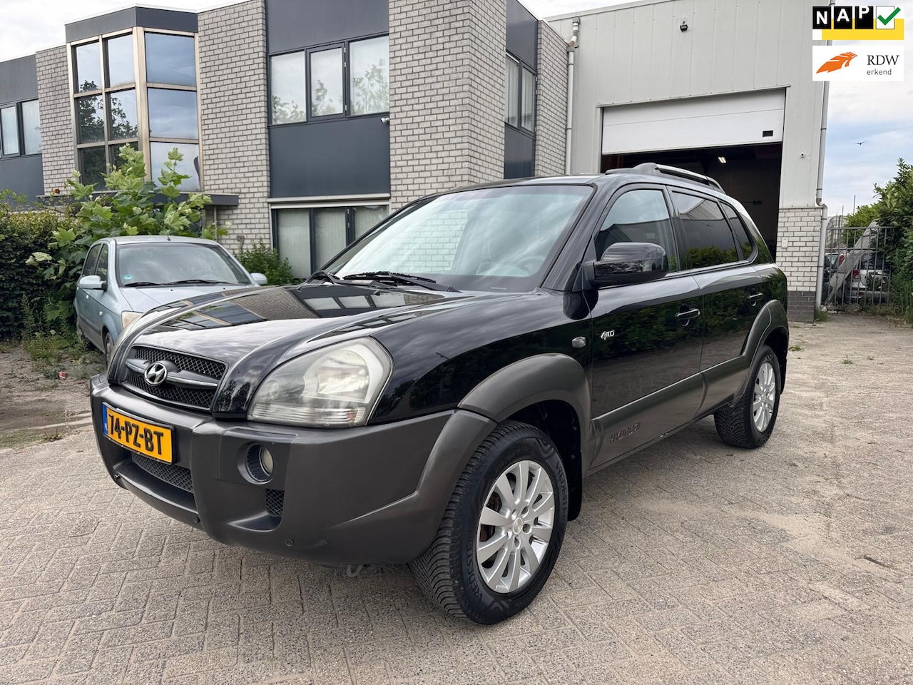Hyundai Tucson - 2.0i 4WD Navi Cruise Control Nap Apk - AutoWereld.nl