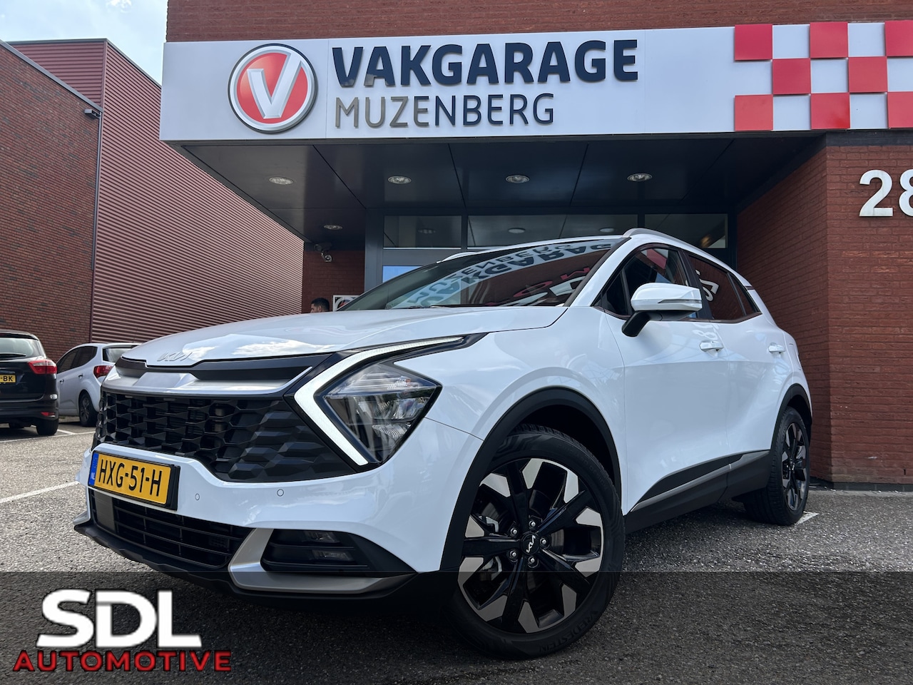 Kia Sportage - 1.6 T-GDi Hybrid DynamicLine AWD // ELEK. STOELEN // STOEL+STUURVERWARMING // NAVI+CARPLAY - AutoWereld.nl