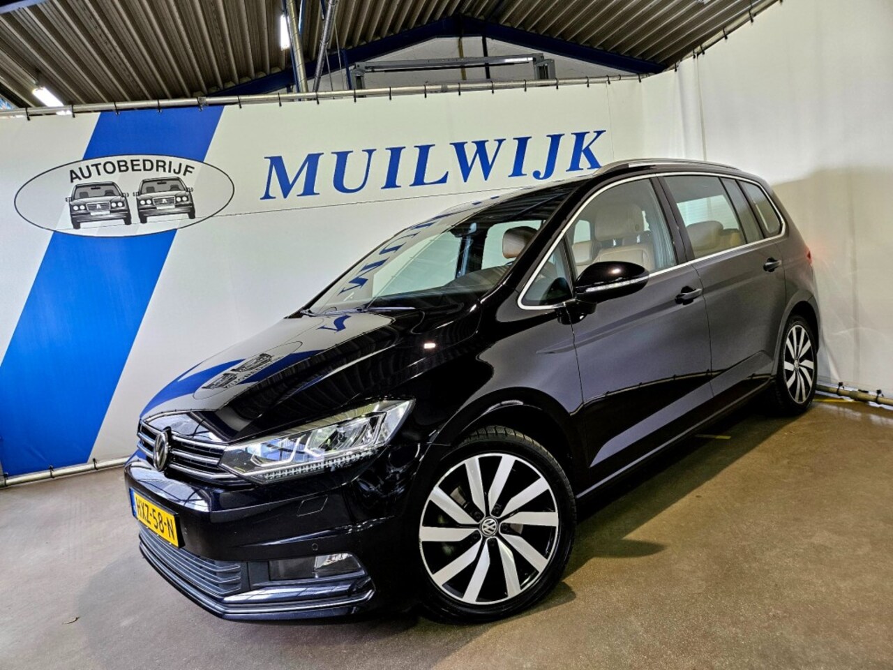 Volkswagen Touran - 1.4 TSI Highline 7 pers. / Full LED / Camera - AutoWereld.nl