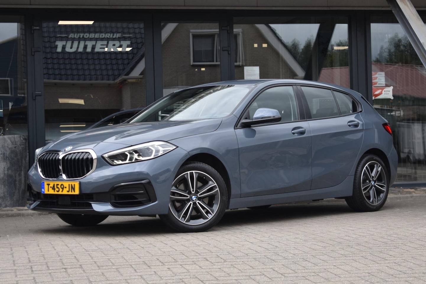 BMW 1-serie - 116i Sportline | CAMERA | APPLE CARPLAY | ANDROID AUTO | NAP | DEALER ONDERHOUDEN - AutoWereld.nl