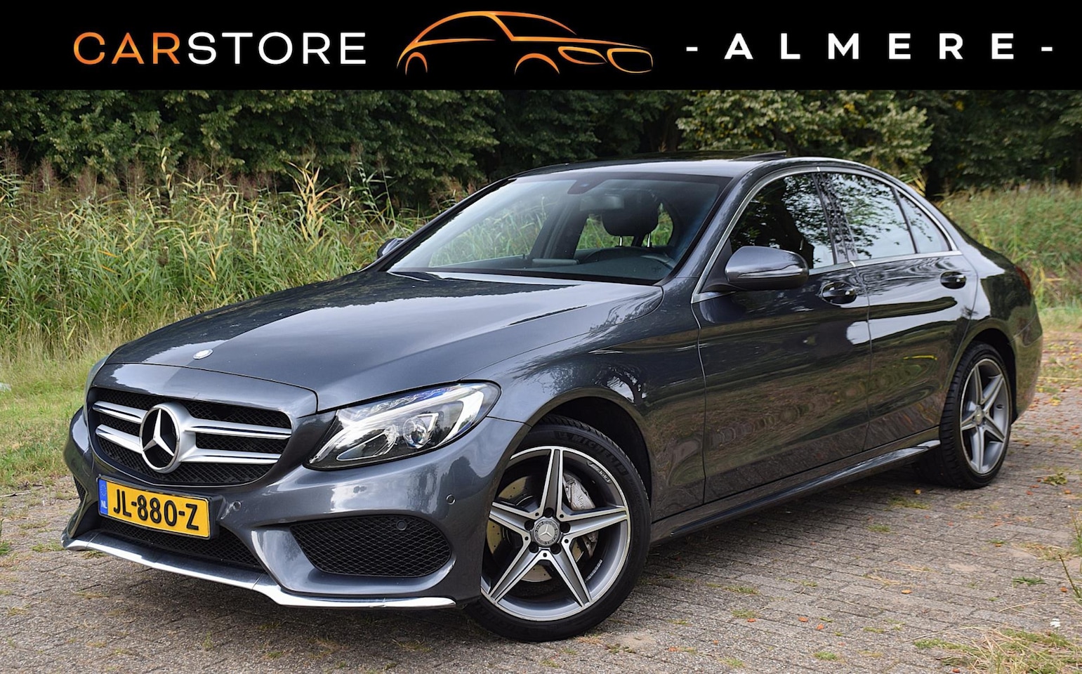 Mercedes-Benz C-klasse - 200 Prestige ///AMG Pakket * Schuifdak * Navigatie * Leder * Automaat * - AutoWereld.nl