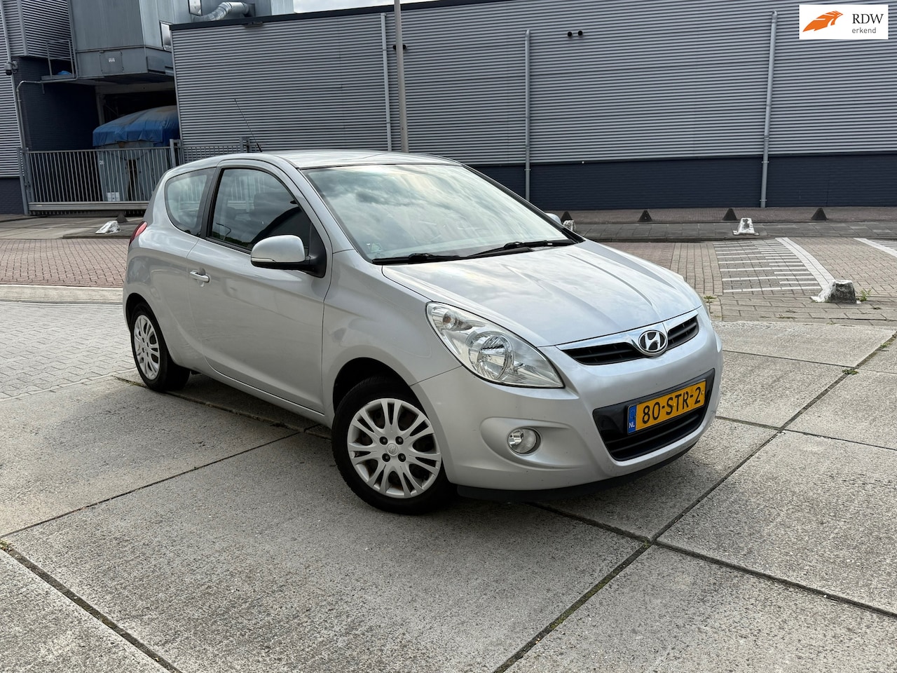 Hyundai i20 - 1.4i i-Motion Airco 5 DR APK - AutoWereld.nl