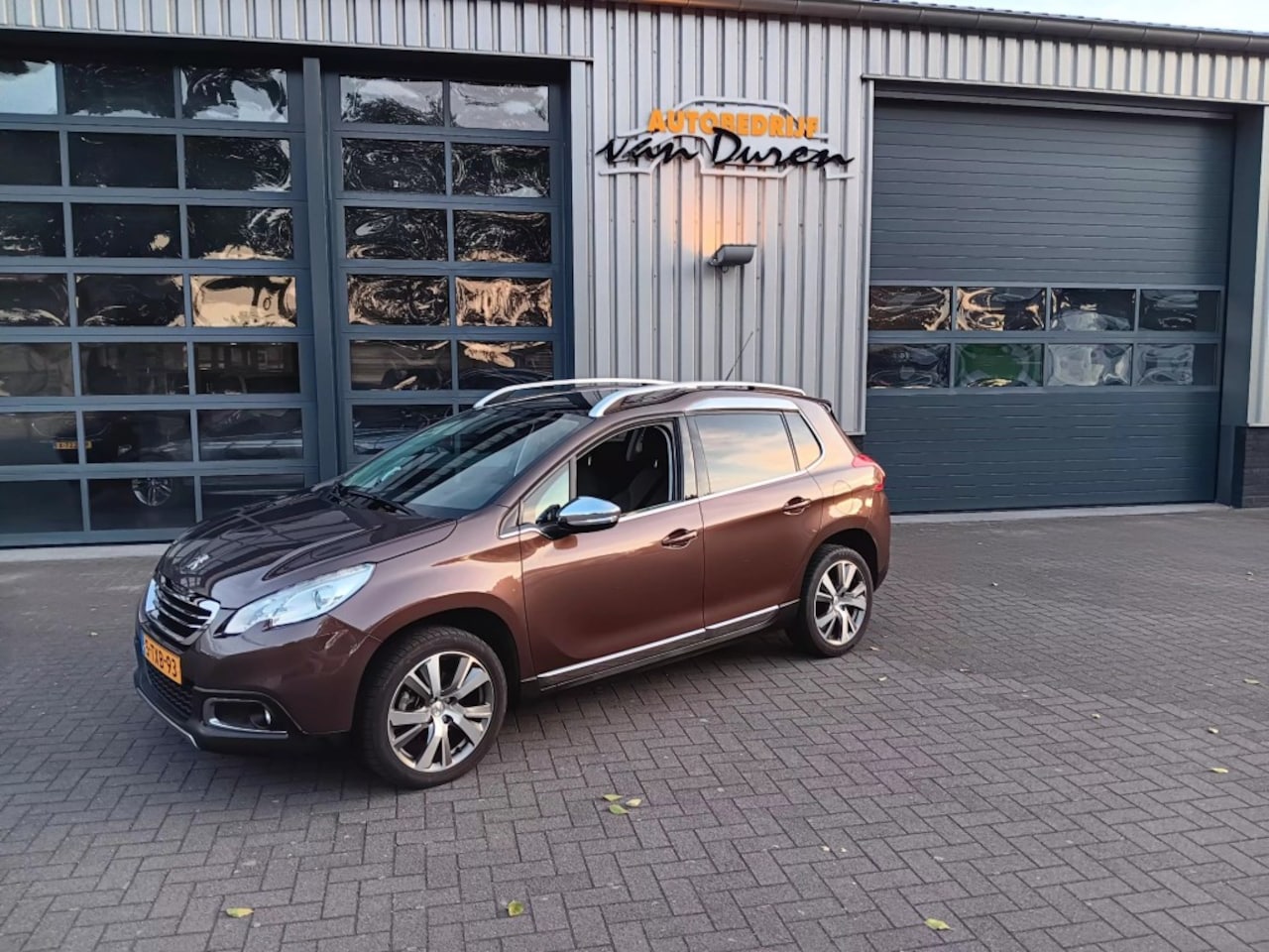 Peugeot 2008 - 1.6 Vti  Feline  120pk   Pano.Dak  Clima/Cruise  Navi half stof/leer  Trekhaak  PDC - AutoWereld.nl