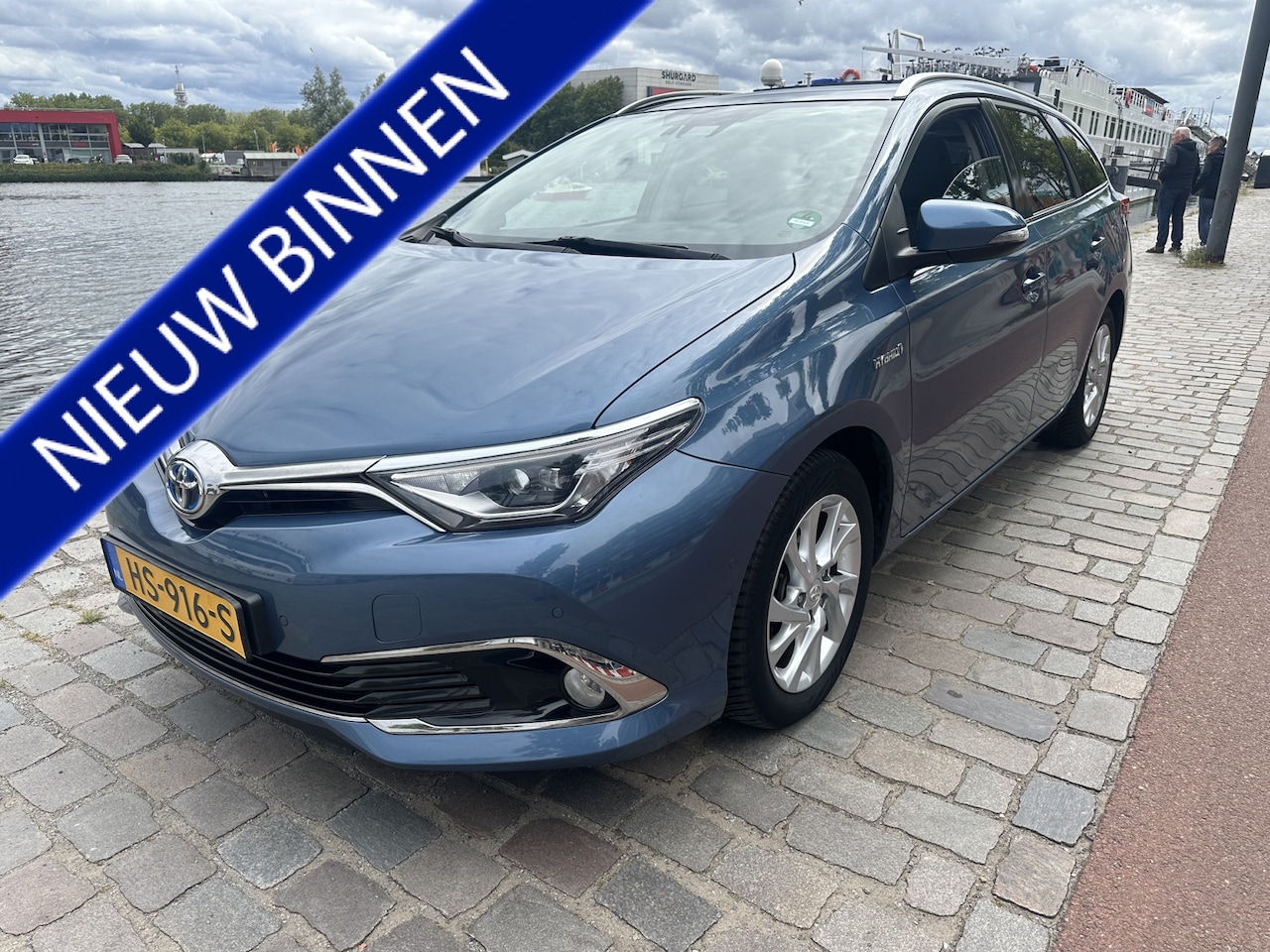 Toyota Auris Touring Sports - 1.8 Hybrid Lease pro PANORAMADAK NAVI/CAMERA AIRCO/ECC - AutoWereld.nl