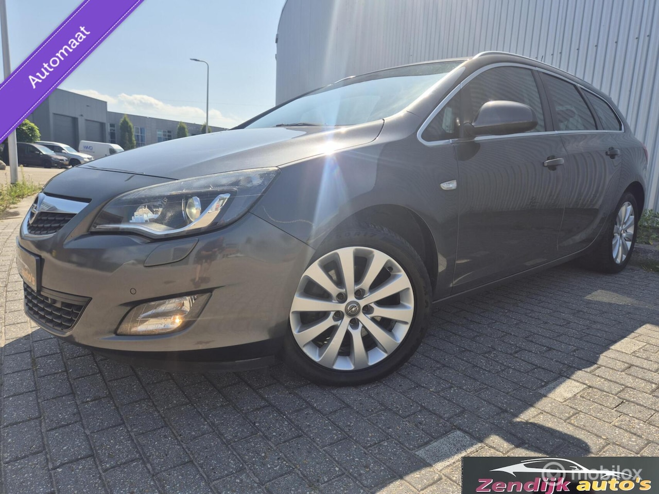 Opel Astra Sports Tourer - 1.6 132 pK Turbo Cosmo /Automaat - AutoWereld.nl