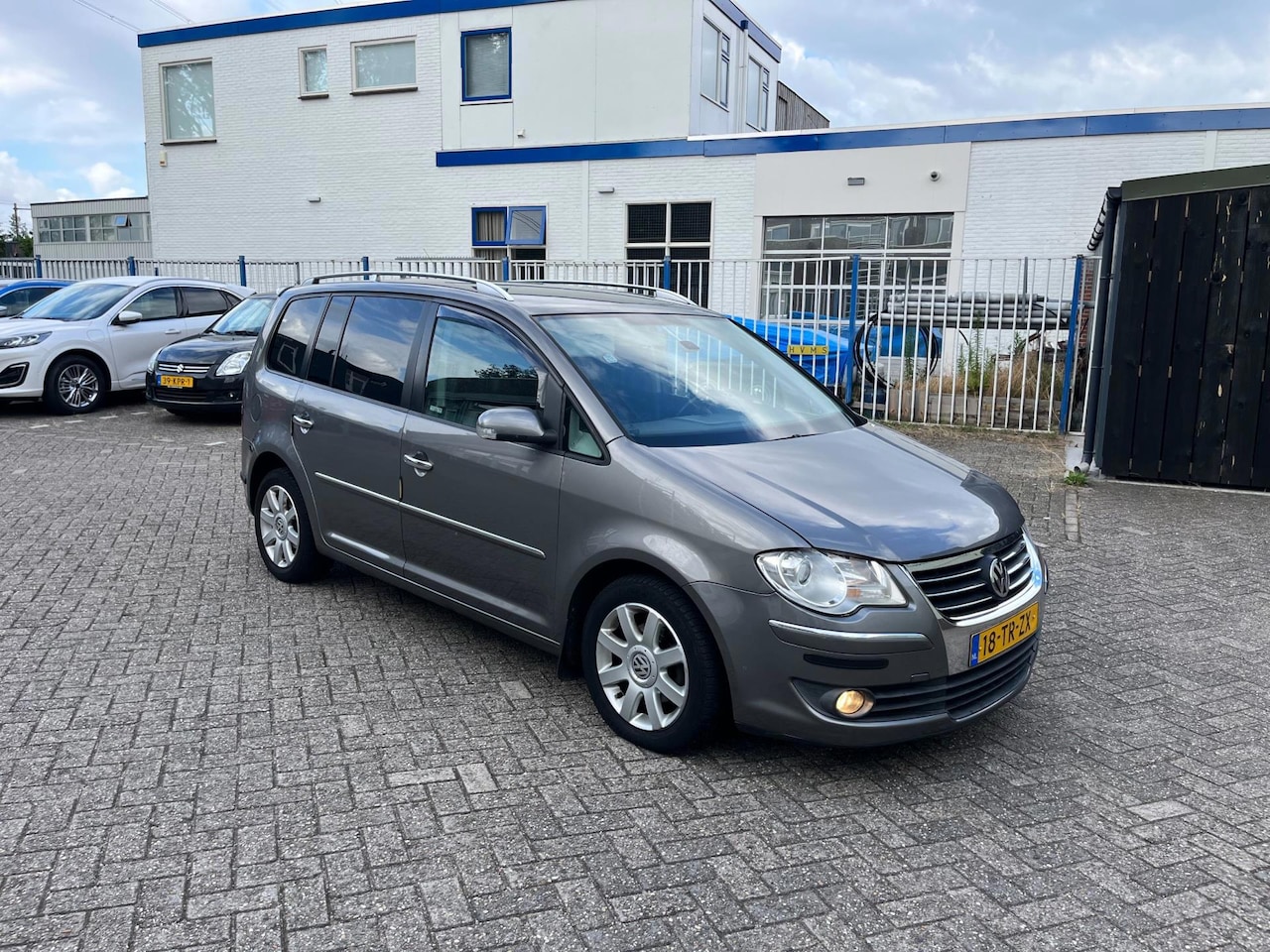 Volkswagen Touran - 1.4 TSI Highline Business 7P - AutoWereld.nl
