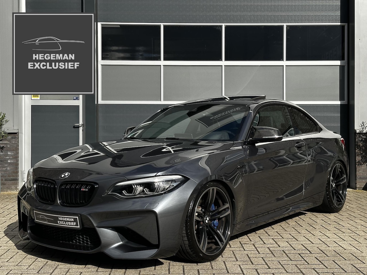 BMW 2-serie Coupé - M2 DCT | CarPlay | Schuif-kanteldak | DAB | H/K | Stoelverwarming | Camera | Cruise | Navi - AutoWereld.nl