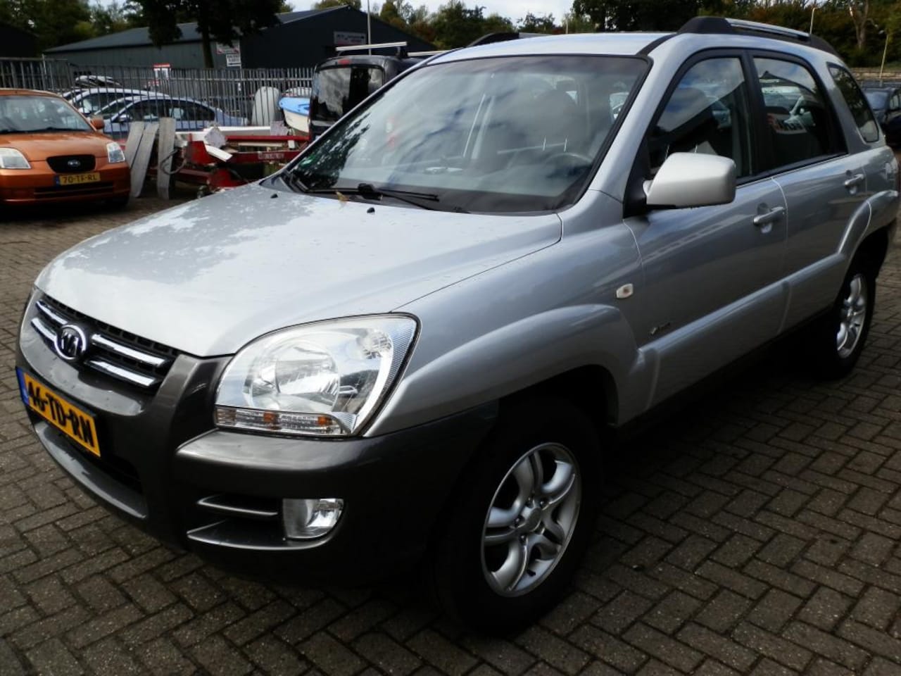 Kia Sportage - 2.0 CVVT Adventure 4WD 2.0 CVVT Adventure 4WD - AutoWereld.nl