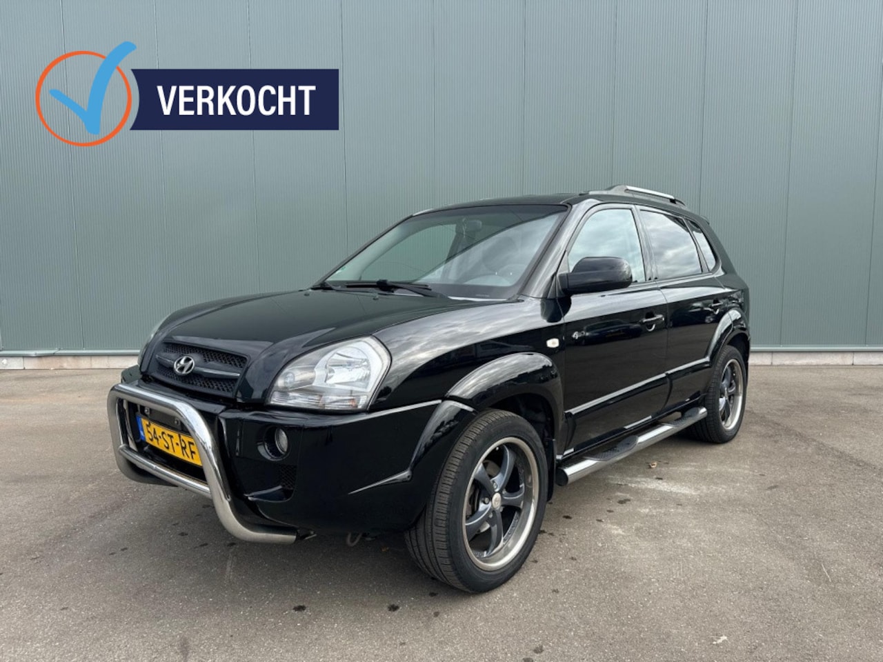 Hyundai Tucson - 2.0i 4WD Style CLIMA | ONDERHOUDSBOEKJE ! - AutoWereld.nl