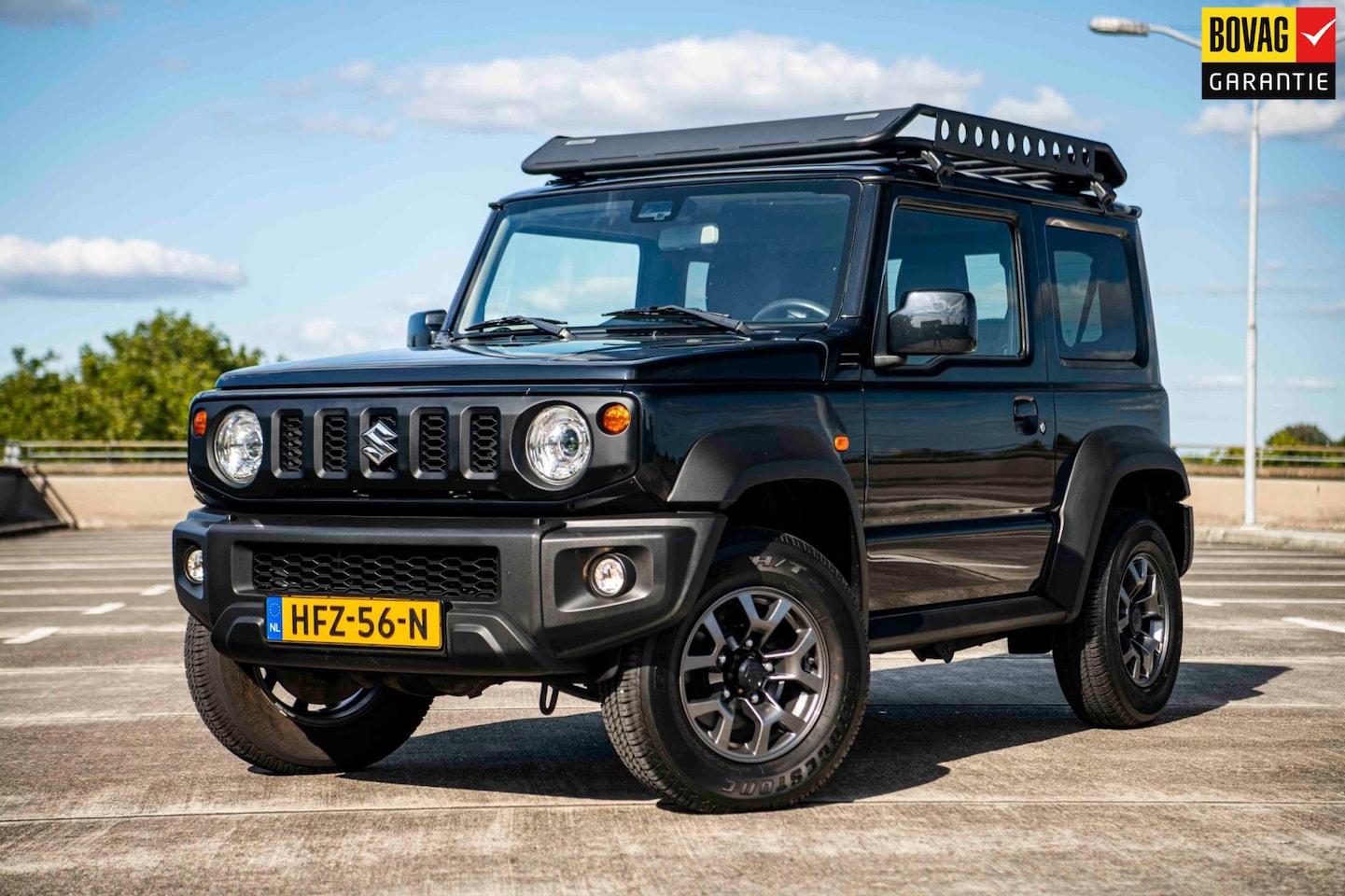 Suzuki Jimny - 1.5 Stijl | 4 Persoons | Airco/Clima | Cruise Control | Navigatie | Stoelverwarming | - AutoWereld.nl
