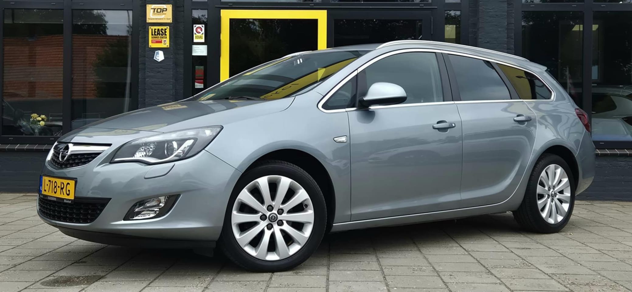 Opel Astra Sports Tourer - 1.4 Turbo Sport | Trekhaak | Parkeer Sensoren | Navigatiesysteem | Cruise Control | Tel. - AutoWereld.nl