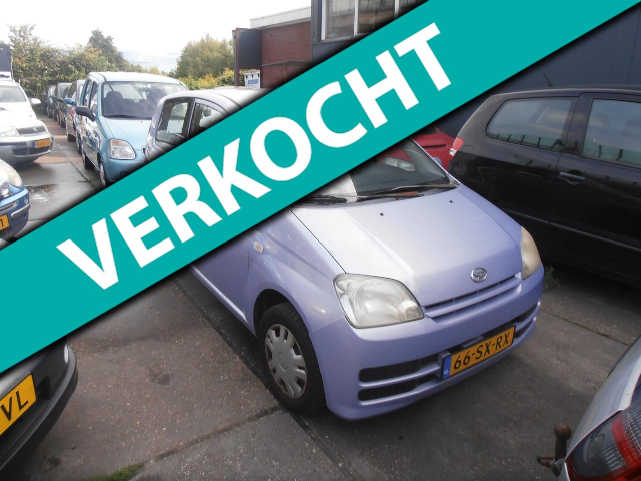 Daihatsu Cuore - 1.0-12V Sporty airco st bekr elek pak nap - AutoWereld.nl