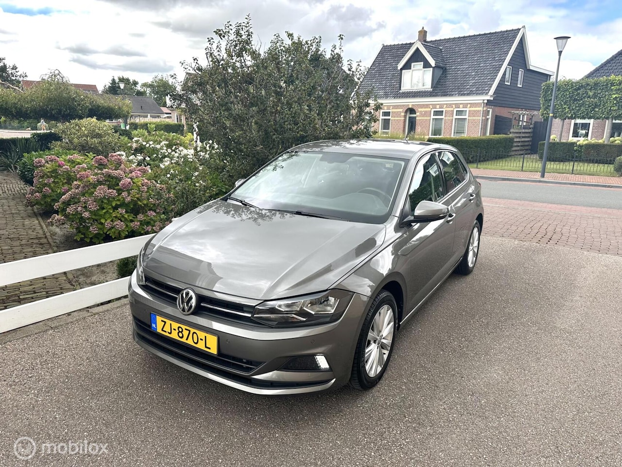 Volkswagen Polo - 1.0 TSI 95PK DSG AUTOMAAT COMFORTLINE CRUISE CONTROLE CARPLAY NAVIGATIE PARKEERSENSOREN GO - AutoWereld.nl