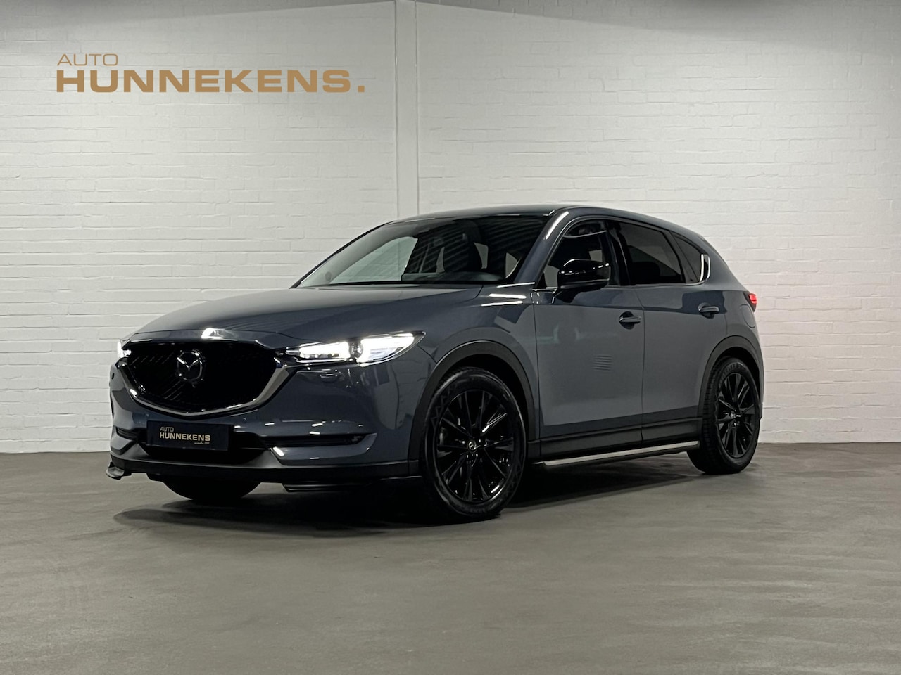 Mazda CX-5 - 2.5 SkyActiv-G Homura *CUSTOM*| Adapt. Cruise control | Trekhaak | Head-up | BOSE | Stoel- - AutoWereld.nl