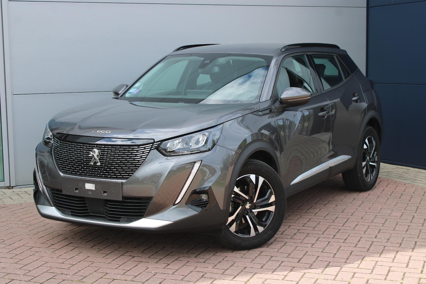 Peugeot 2008 - 1.2 PureTech Allure NAVIGATIE - 18.900 KM - AutoWereld.nl