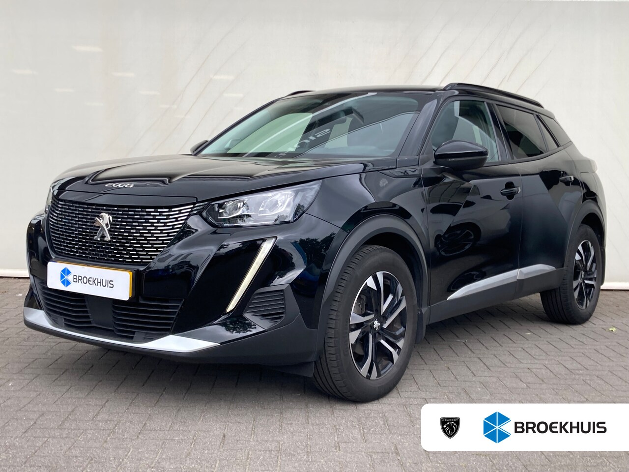 Peugeot 2008 - 1.2 PureTech Allure Pack | Airco | Camera | Cruise | Navi | Pdc achter | Automaat ! | - AutoWereld.nl
