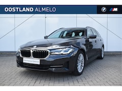 BMW 5-serie Touring - 520e High Executive Automaat / Trekhaak / Laserlight / Stoelverwarming / Live Cockpit Prof