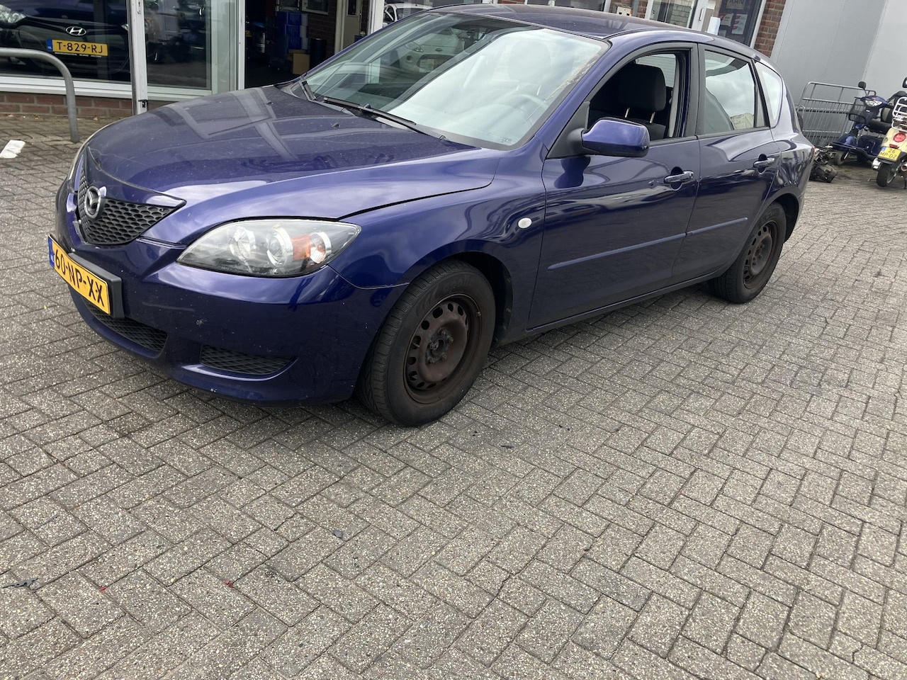 Mazda 3 Sport - 1.6 Touring Export - AutoWereld.nl