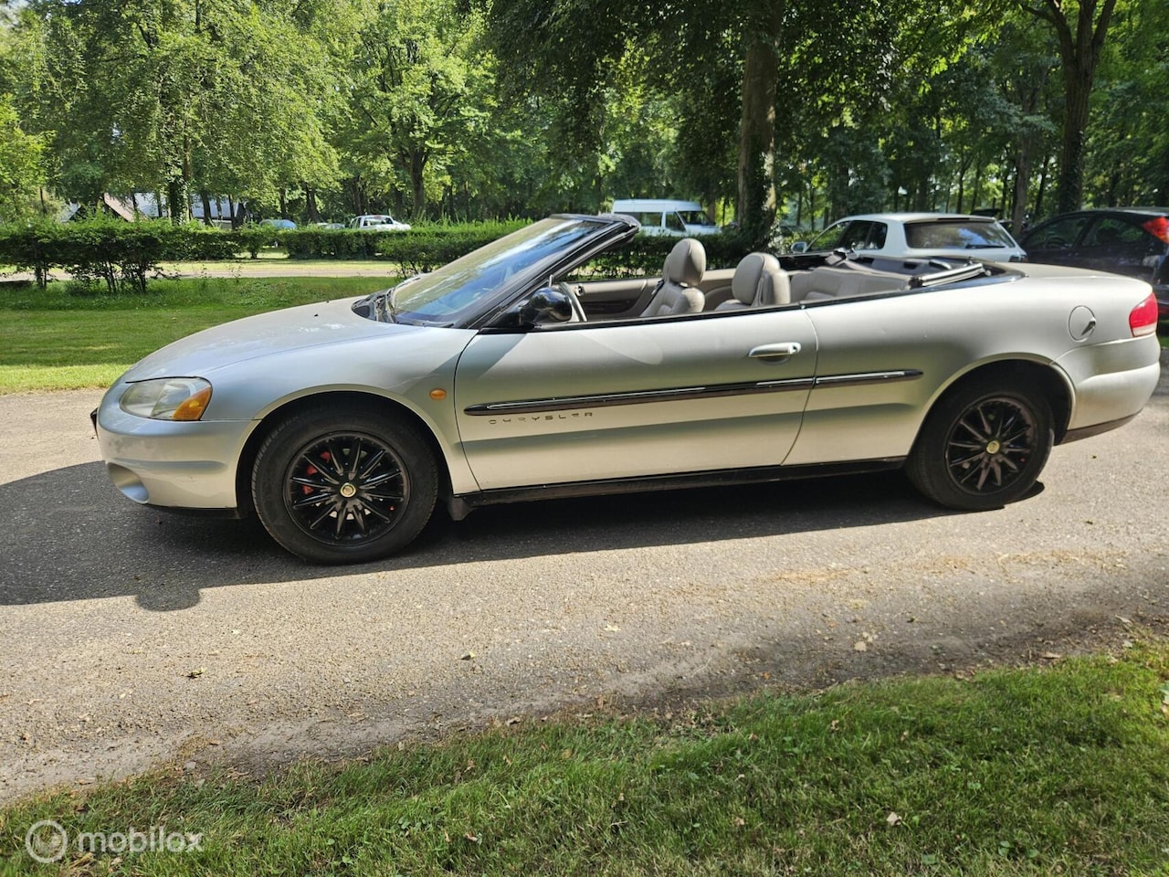 Chrysler Sebring Cabrio - 2.7i-V6 24V Limited Convertible LEES TEKST! - AutoWereld.nl