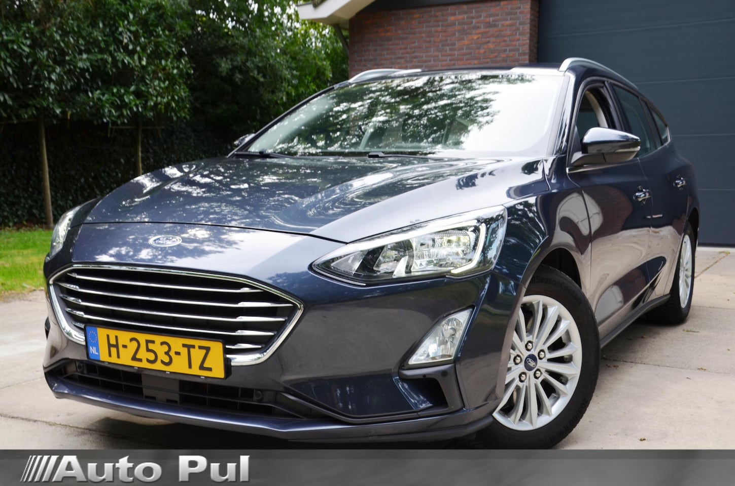 Ford Focus Wagon - 1.0 EcoBoost Titanium Business Navi/Pdc/Ecc/Led/Stoel&stuur verwarming/Cr-Controle/Privacy - AutoWereld.nl