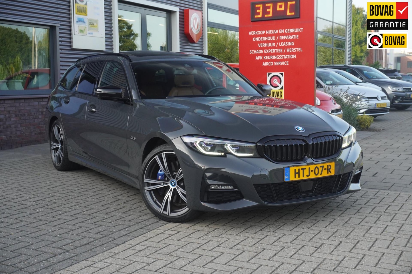 BMW 3-serie Touring - 330e / M-Sport / M Sportstoelen / Dravitgrau / Pano - AutoWereld.nl