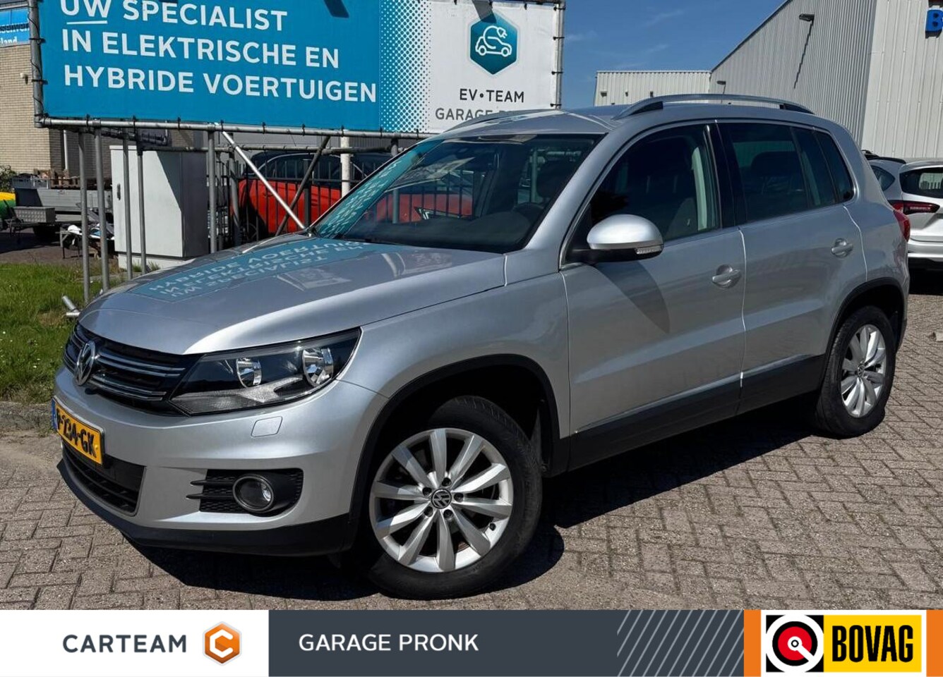 Volkswagen Tiguan - 1.4 TSI Sport&Style navigatie - AutoWereld.nl
