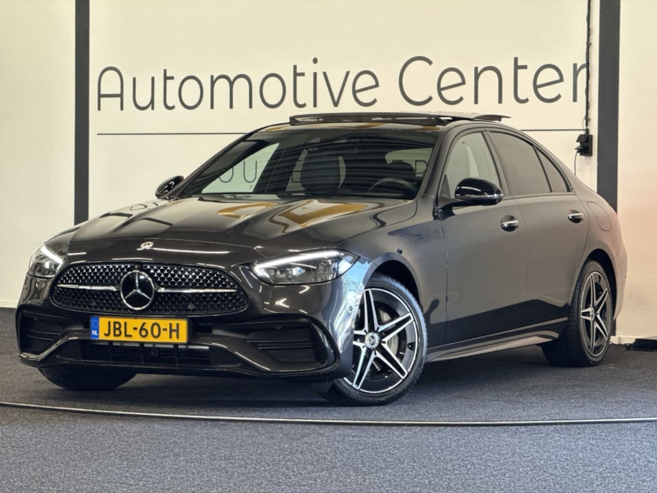 Mercedes-Benz C-klasse - 300 e Star E AMG L + | PANO | MASSAGE | HEAD-UP | BURMESTER - AutoWereld.nl