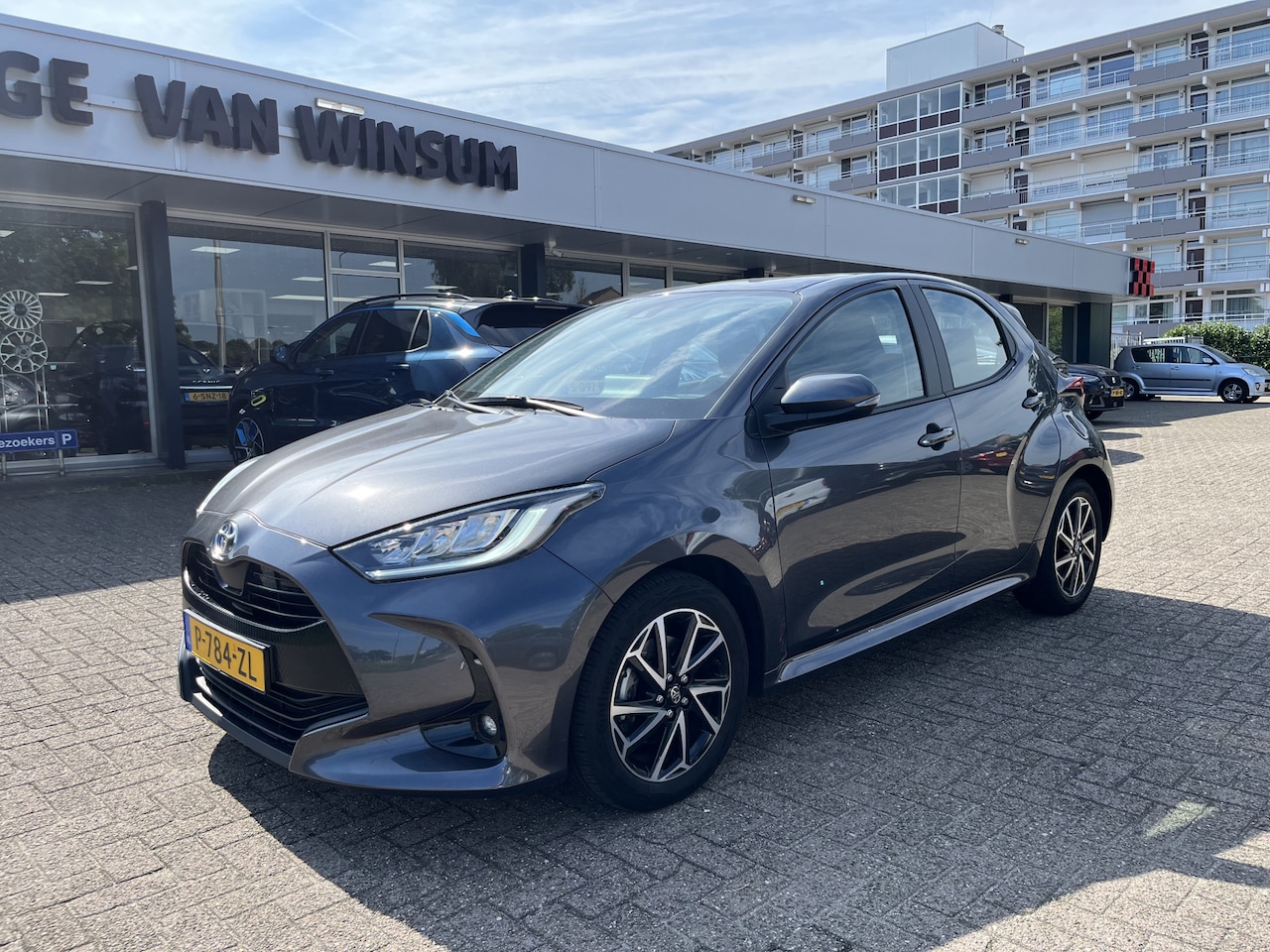 Toyota Yaris - 1.5 Hybrid Dynamic Lmv Cruise Navi Klima Acamera Nap - AutoWereld.nl